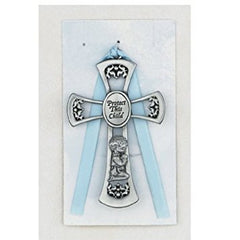 McVan blue cross crib decor enhances a baby boy nursery with a timeless symbol