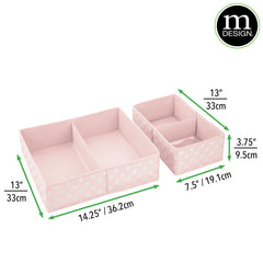 mDesign diaper bin organized in a nursery drawer