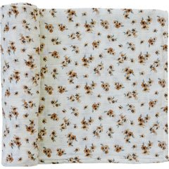 Mebie Baby Autumn Bloom swaddle laid out for newborn snugness and breathable comfort