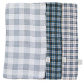 Mebie Baby burp cloth plaid muslin set shown in soft hues protecting outfits from spit-up.