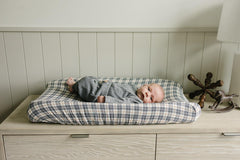 Mebie Baby designer nursery cover on changing pad showcases durable, easy-to-clean design.