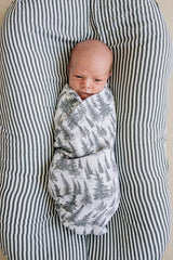 Mebie Baby forest swaddle texture closeup showing soft fabric and airy feel.
