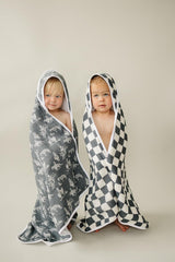 Close-up of Mebie Baby muslin towel fabric texture and cotton softness