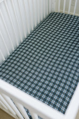 Mebie Baby navy plaid muslin sheet on standard crib mattress, easy to fit and coordinate in modern nurseries