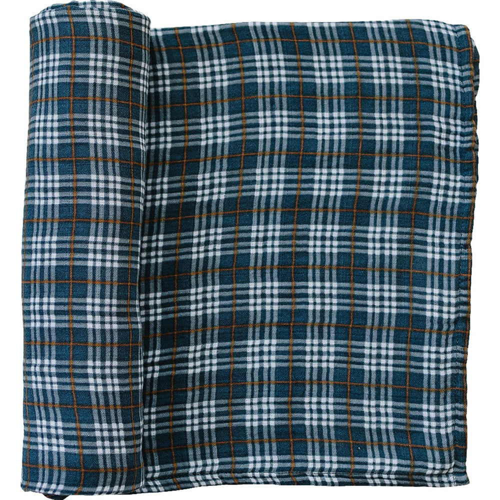 Mebie Baby navy plaid swaddle close-up, breathable muslin for cozy baby comfort.