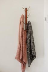 Mebie Baby Olive Bloom swaddle folded highlights lightweight blanket versatility for everyday use.