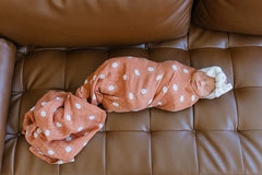 Large 47 by 47 inch swaddle ideal for secure newborn wrapping.