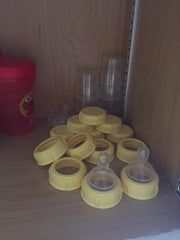 Medela wide-base yellow collar for slow flow nipples, easy replacement
