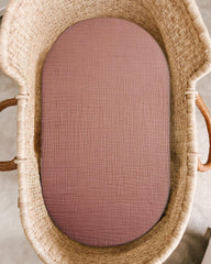 Meowcards bassinet sheet muslin dusty rose oval fit showing snug safety