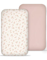 Meowcards muslin bassinet sheet in rosy pattern offering breathable, cozy comfort for newborn naps.
