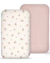 Meowcards muslin bedside bassinet sheets in vintage blossom pattern create a calming nursery look.