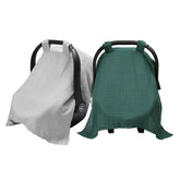 Meracorallo muslin car seat cover in green and gray shields sun and wind.