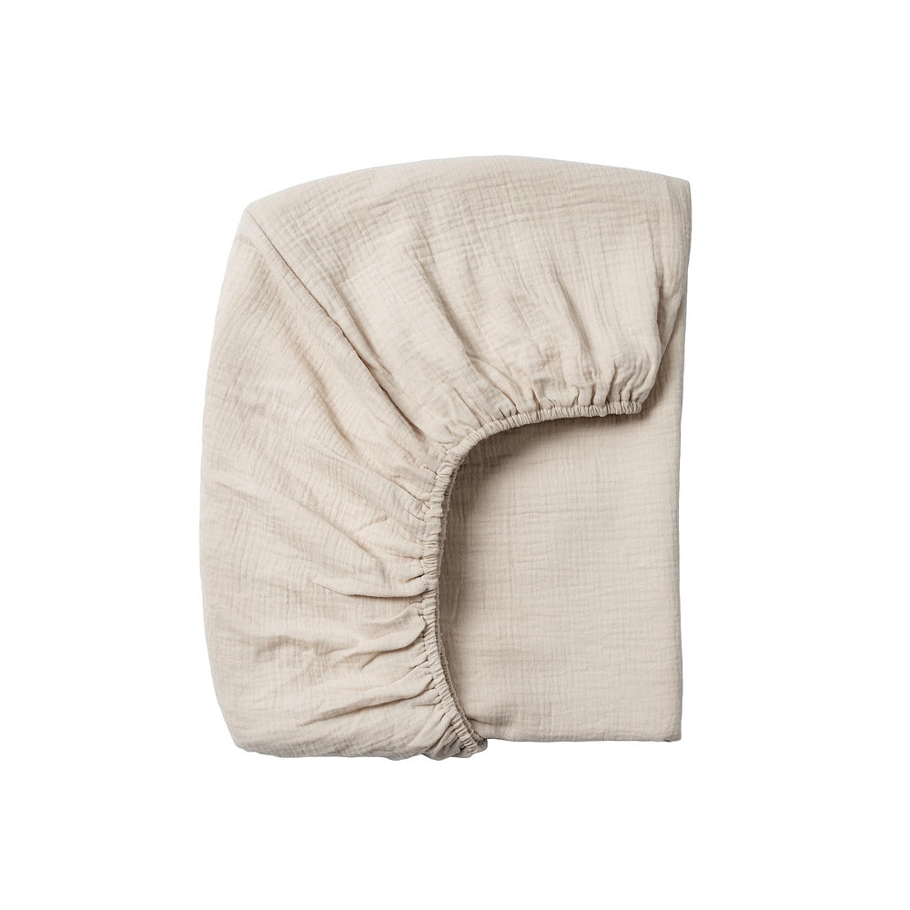 Meracorallo muslin crib sheet on a 28x52 mattress for breathable sleep surface.