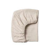 Meracorallo muslin crib sheet on a 28x52 mattress for breathable sleep surface.