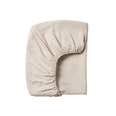 Meracorallo muslin crib sheet on a 28x52 mattress for breathable sleep surface.