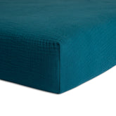 Meracorallo teal muslin crib sheet offers breathable, soft fabric for baby sleep