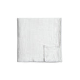 Meracorallo Muslin Swaddle Blanket close-up shows soft cotton texture for gentle baby skin.