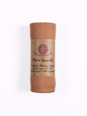 Meracorallo camel swaddle fabric close-up shows silky-soft bamboo-cotton blend.