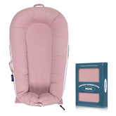 MEXXI corduroy lounger cover for DockATot Deluxe+ fits snugly for naps.