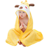 MICHLEY giraffe hooded towel face close-up showing plush cotton for gentle drying.