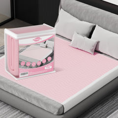 MILDPLUS bed pad with side wings stays secure under the sheet for restless sleepers.