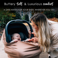 Milk Snob Cocoa car seat cover shields baby from sun and wind.