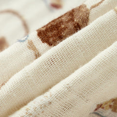 Milkbarn baby swaddle in a nursery setting