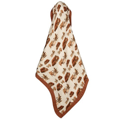 Milkbarn Homestead muslin blanket triple-layer design provides warmth without overheating.