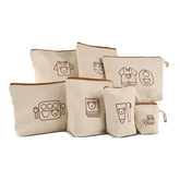 Mini Nomad 7pc diaper bag organizers set with versatile pouches for tidy baby essentials.
