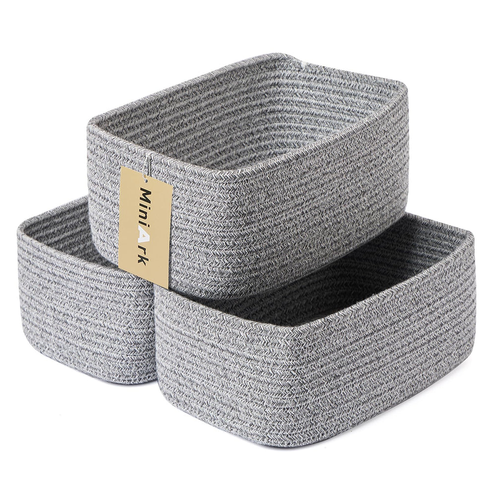 MiniArk small storage baskets organize cosmetics and keys on a dresser.
