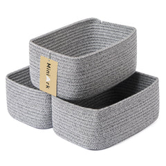 MiniArk small storage baskets organize cosmetics and keys on a dresser.