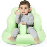 Mink inflatable baby seat Grass Green front view with safe, cushioned support