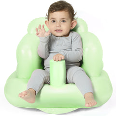 Mink inflatable baby seat Grass Green front view with safe, cushioned support