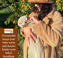 Minora pacifier holder keeps pacifier close and easy to access