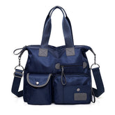 MINTEGRA nylon tote bag with waterproof exterior for daily use and rain protection.