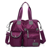 MINTEGRA nylon tote with front pockets keeps daily essentials organized on the go.