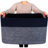 Mintwood Design 22in rectangle rope basket holds blankets for tidy living room storage.
