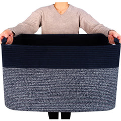 Mintwood Design 22in rectangle rope basket holds blankets for tidy living room storage.