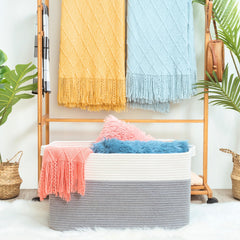 Mintwood Design rectangle rope storage basket with handles ideal for laundry and living spaces.