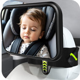Mirrorsafe fixed headrest mirror on a Tesla back seat for safe baby monitoring.