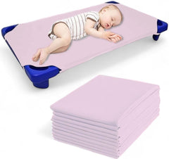 Mississippi Cotton Pack6 cot sheet blush 22x40 on bed keeps daycare cots clean and comfy.