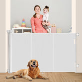 Miumoon 71-inch retractable gate installed on doorway for child and pet safety