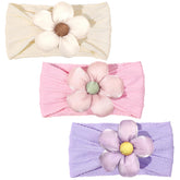 MIUXUESO pink flower headband with gentle elasticity for newborns.