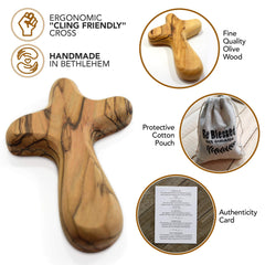 MIZZE clinging cross in natural cotton pouch, ready for thoughtful gifting.
