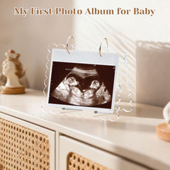 Mlatnod stand and desk display featuring the photo album for nursery decor.