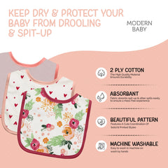 MODERN BABY rose floral burp cloths catching spills during feeds.