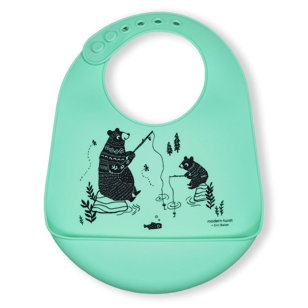 Modern Twist Bucket Bib with pocket catches spills for easy cleanup at meals.