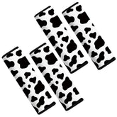 Mokiwala cow-pattern car seat belt pad cover seen from the front for comfortable cushioning.