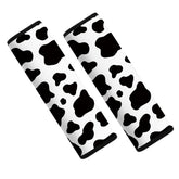 Mokiwala cow-pattern seatbelt pad close-up on soft neoprene for comfort