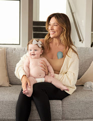 Momcozy massager displaying 3-in-1 care modes for customizable relief.